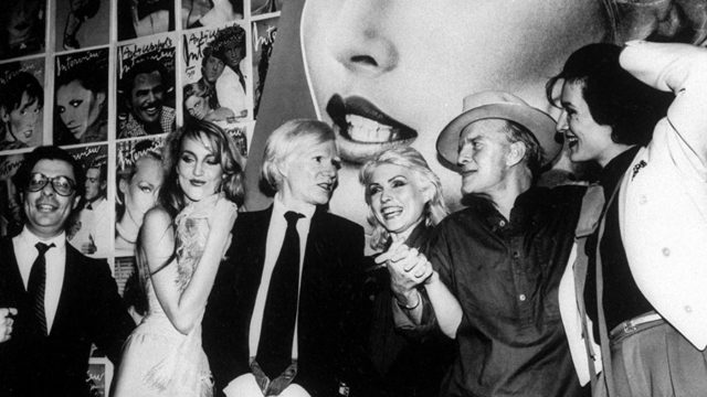 People socializing at Studio 54's opening night