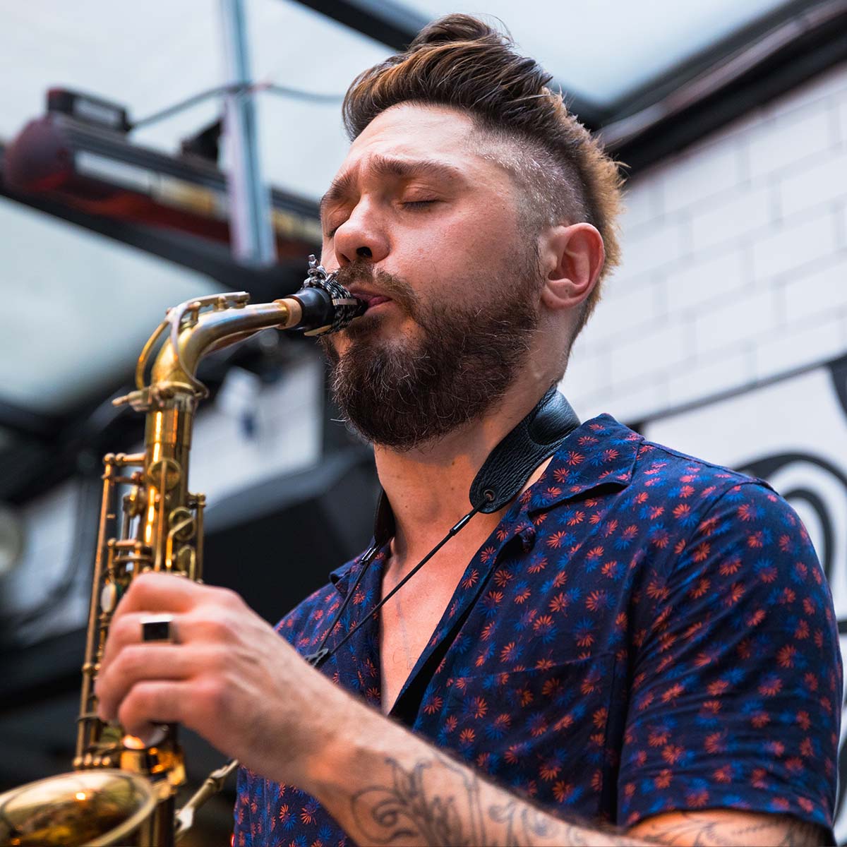 Photo of Nick Biello performing on the saxophone