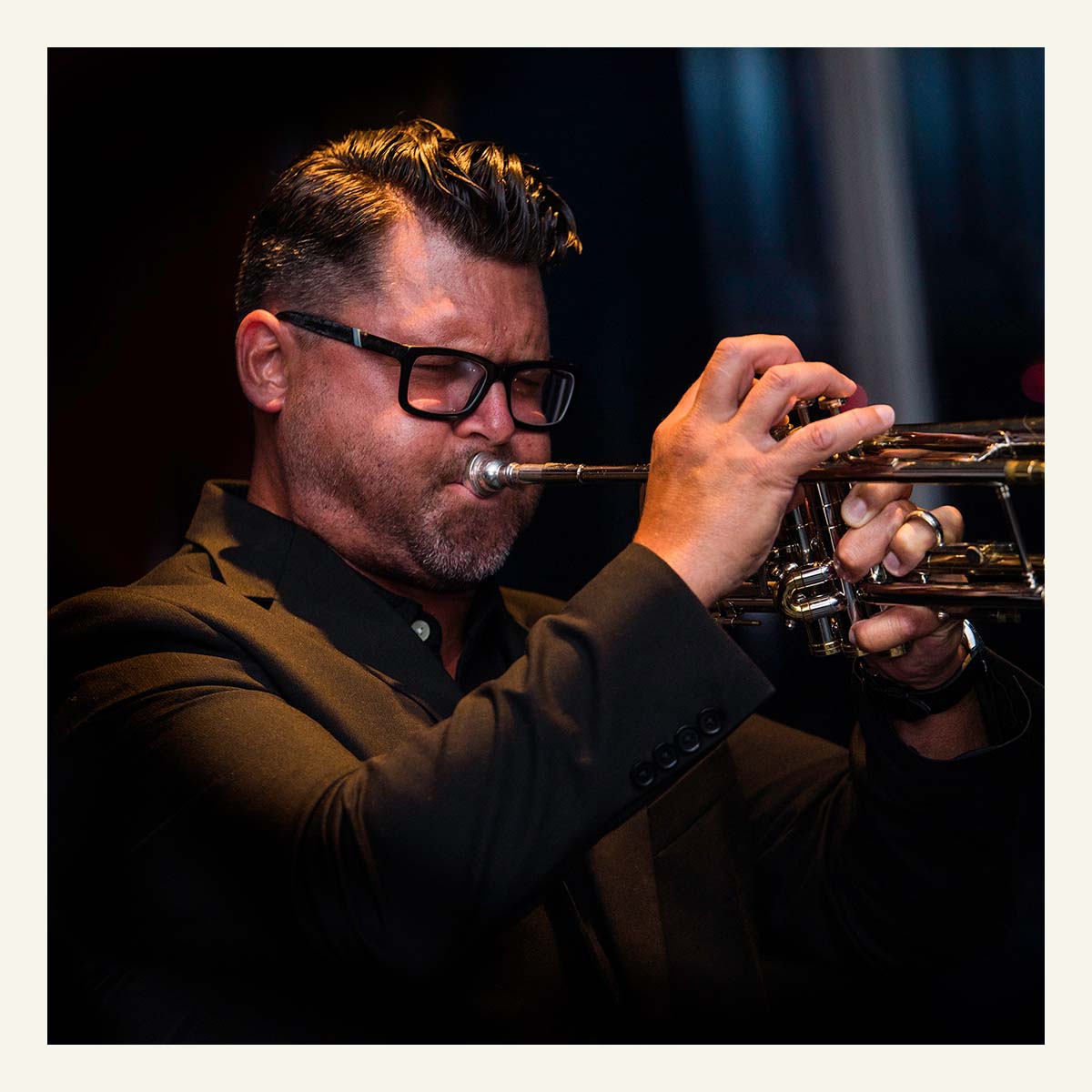 Image of Eric Jacobson playing the trumpet LIVE at the Roxy Bar