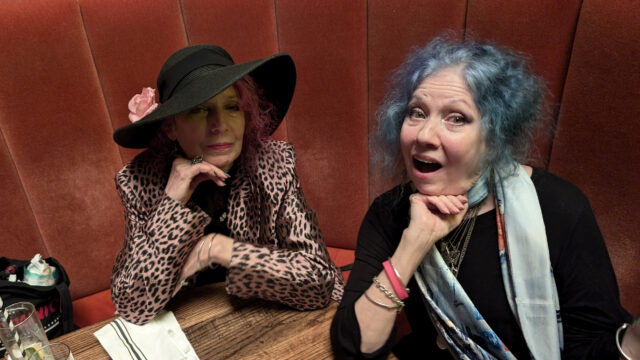 Sisters Tish and Snooky Bellomo sitting in a booth at the Roxy Hotel.