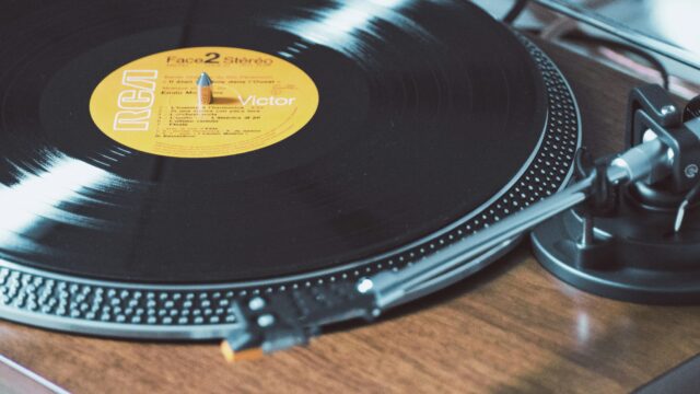 Close-up of a spinning vinyl record on a turntable.