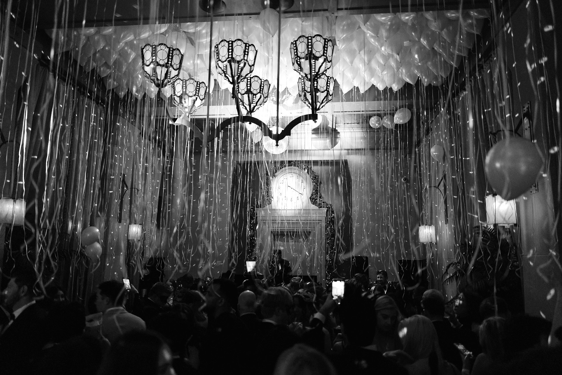 A crowd of people dancing during Soho Grand Hotel's New Year's Eve celebration.