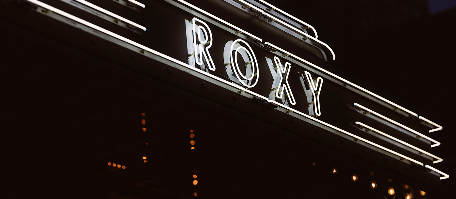 The Roxy Hotel New York City's iconic marquee. It has a neon sign that reads "Roxy"
