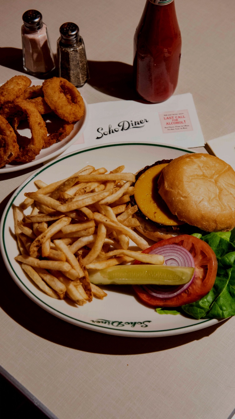 Cheeseburger, Fries and Onion Rings at Soho Diner.