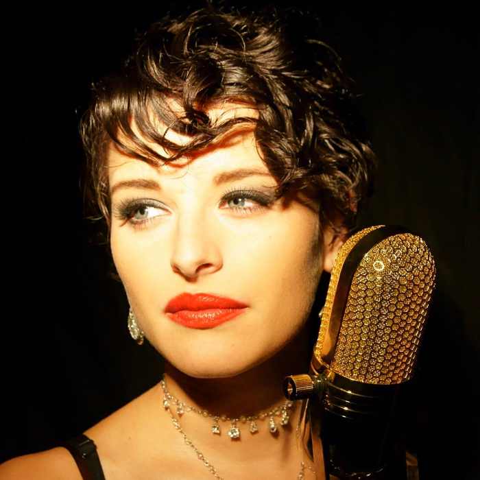 Musician Lee Taylor at the microphone.