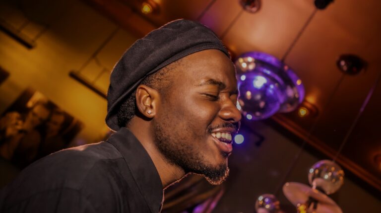 Closeup Headshot of singer Tyreek McDole.