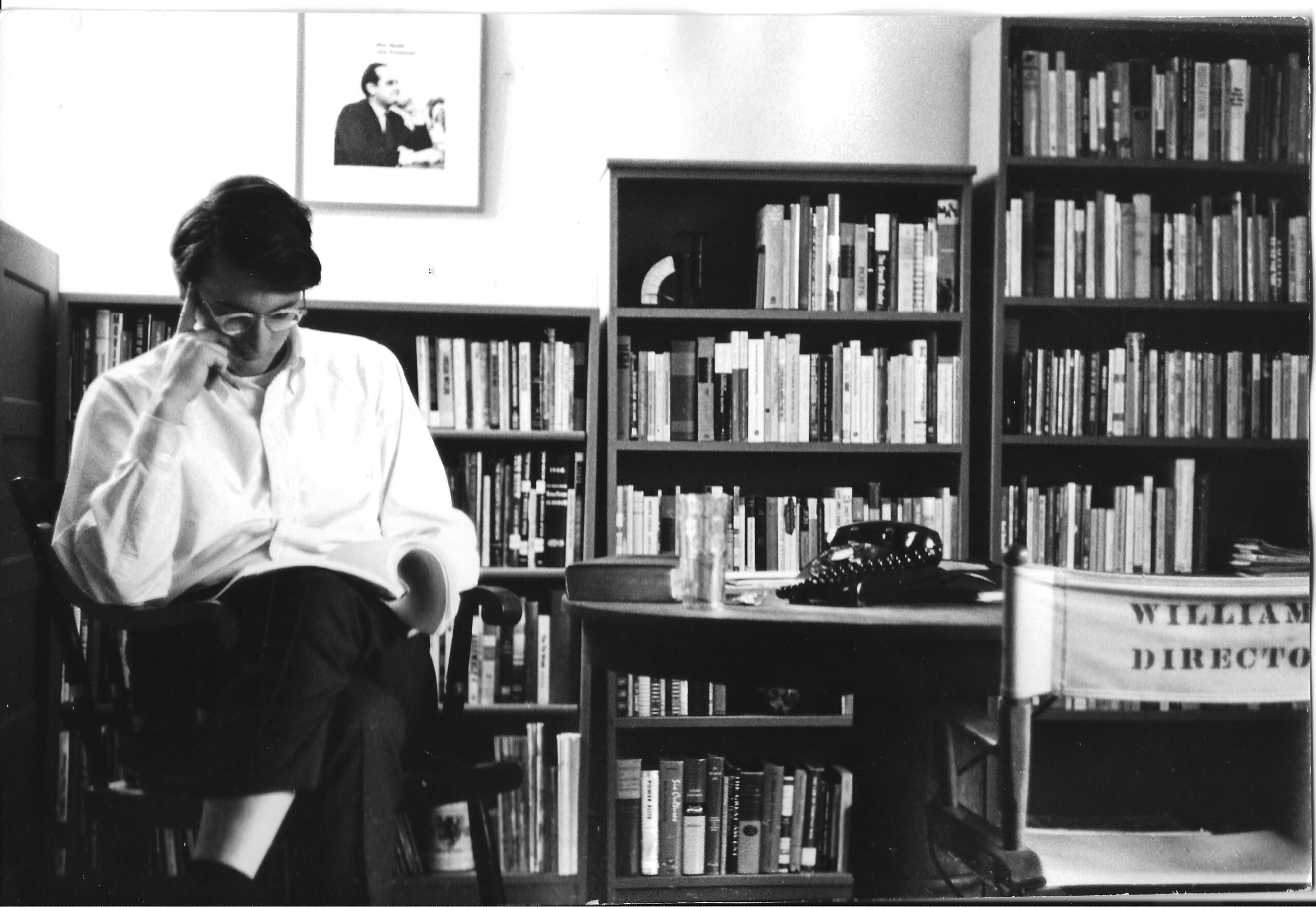 Black and white photo of Paul Williams in his study.