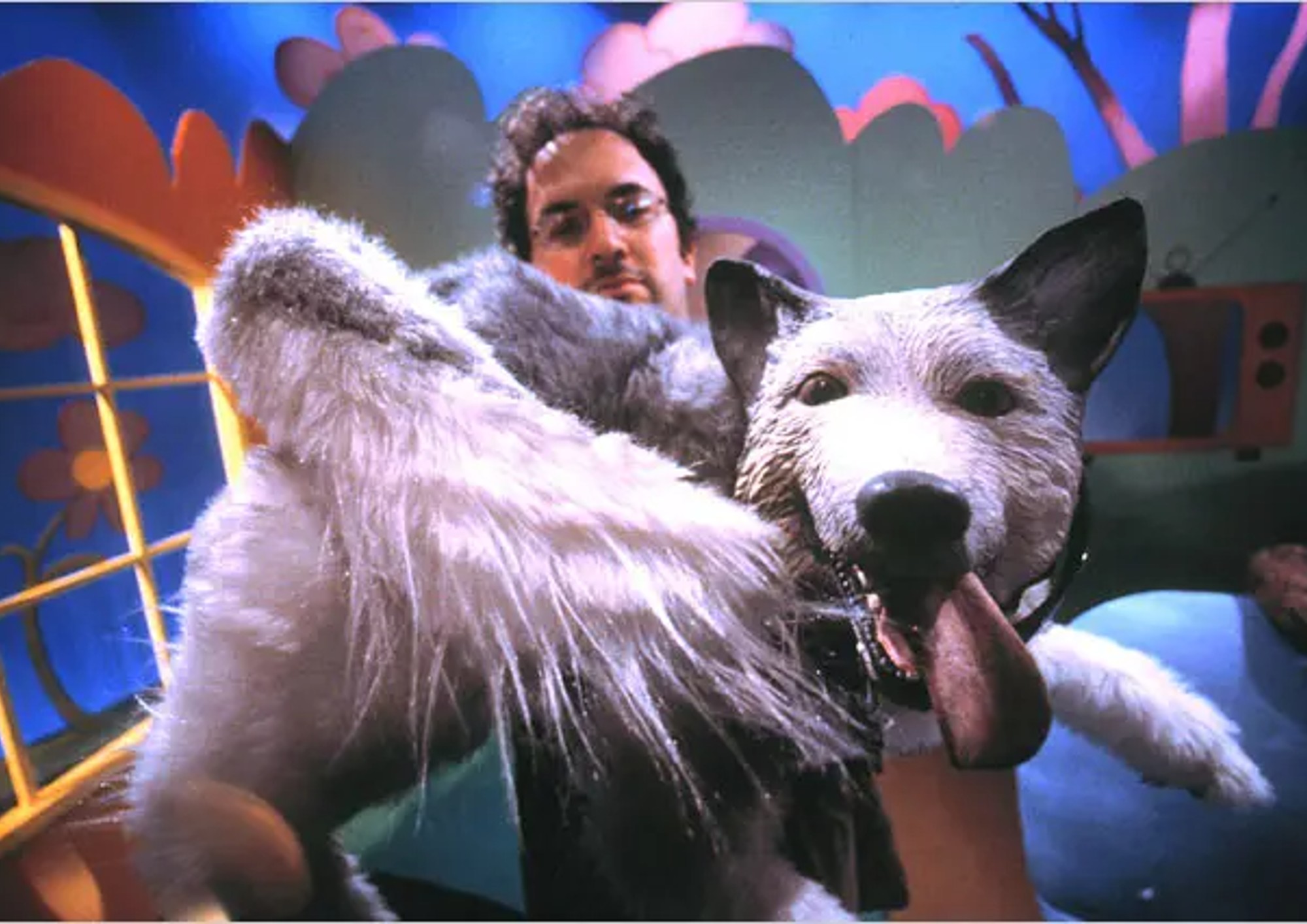 Image of comedian Robert Smigel with dog puppet