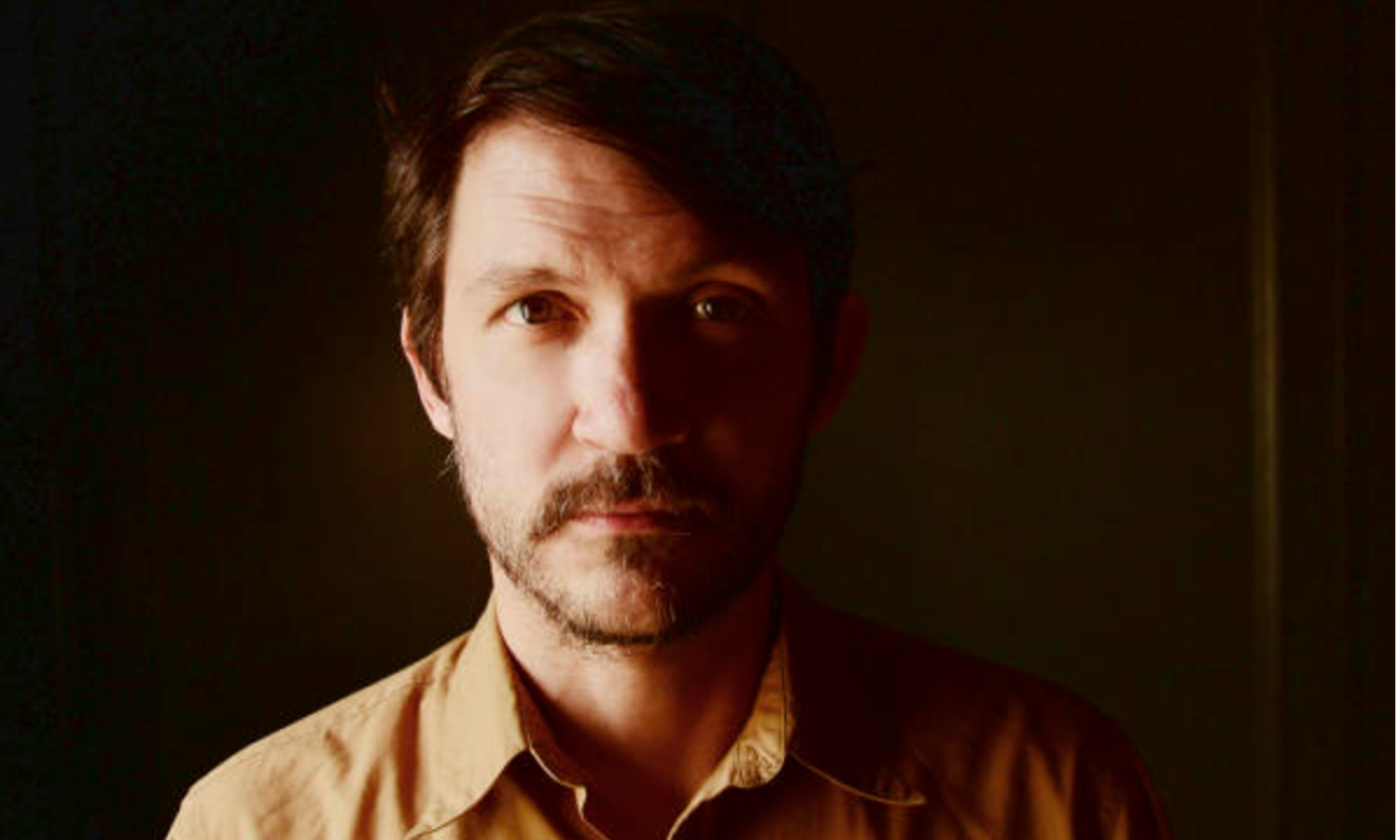 headshot of filmmaker/musician Tim Kasher