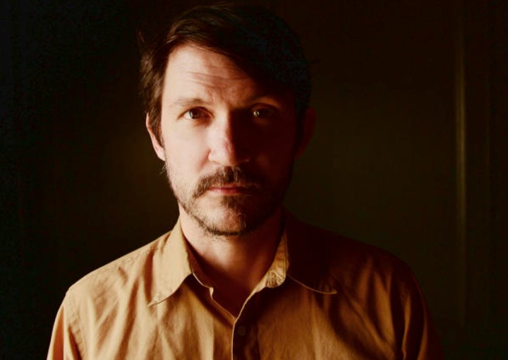 headshot of filmmaker/musician Tim Kasher