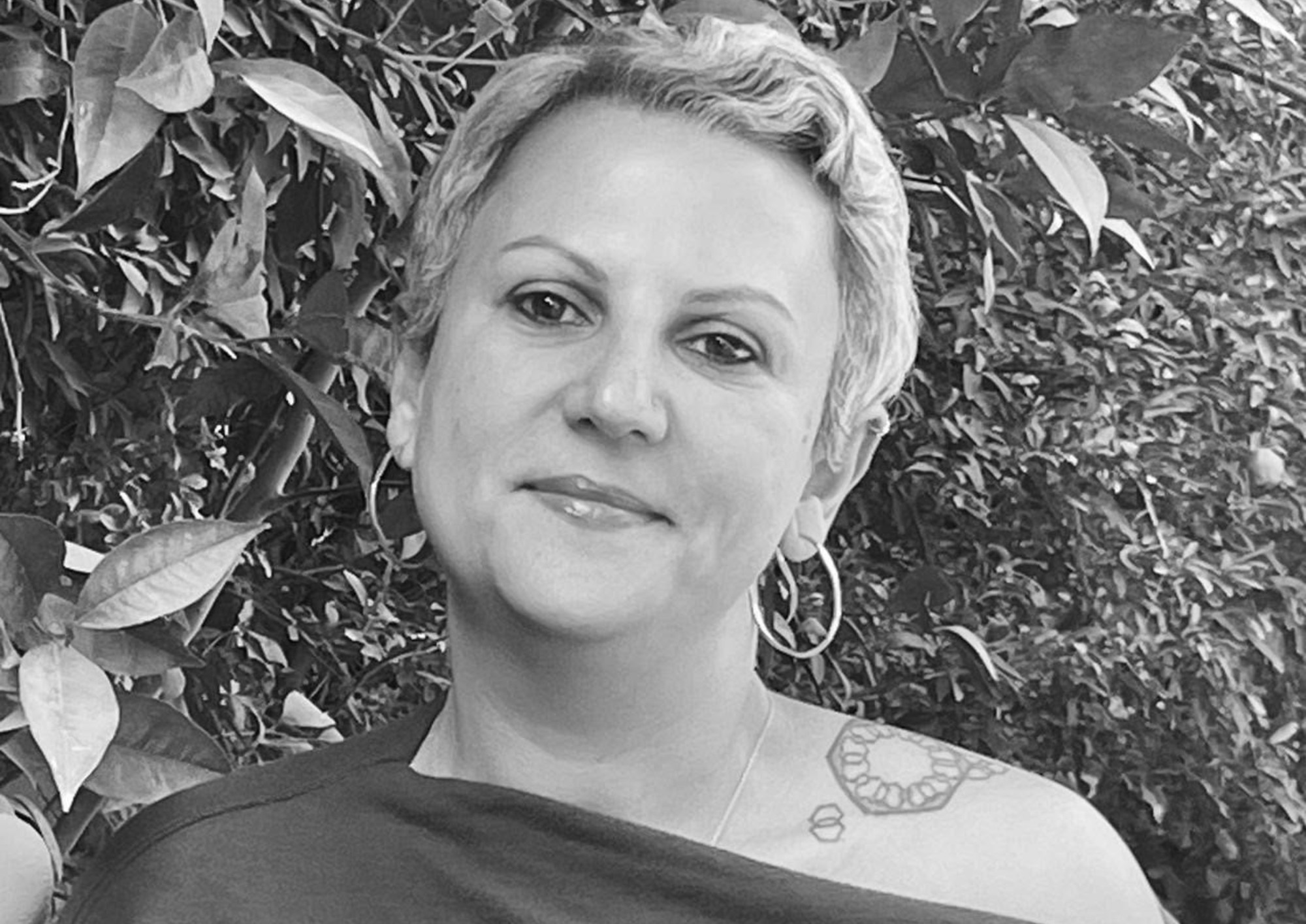 headshot of Dina Ramadan