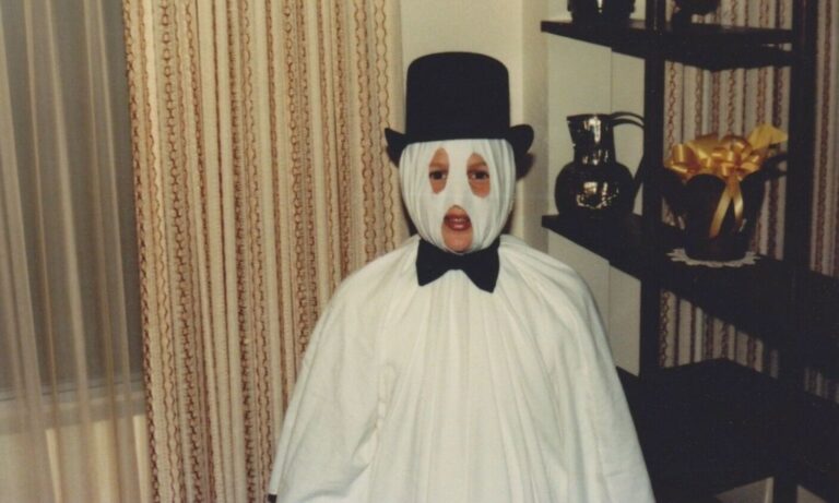 Promo image of child in ghost costume for 1-800-Hot-Duck